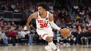 Nov 4, 2025; Chicago, Illinois, USA; Chicago Bulls guard Tre Jones (30) drives to the basket against the Philadelphia 76ers during the first half at United Center. Mandatory Credit: Kamil Krzaczynski-Imagn Images
