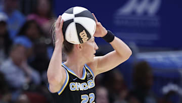 Jun 7, 2025; Chicago, Illinois, USA; Chicago Sky guard Courtney Vandersloot (22) looks to pass the ball against the Indiana Fever during the first half of a WNBA game at United Center. Mandatory Credit: Kamil Krzaczynski-Imagn Images