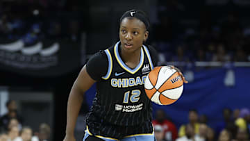 Aug 25, 2025; Chicago, Illinois, USA; Chicago Sky forward Michaela Onyenwere (12) controls the ball against the Las Vegas Aces during the first half at Wintrust Arena. Mandatory Credit: Kamil Krzaczynski-Imagn Images