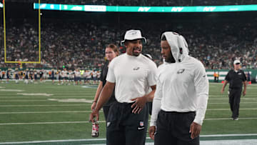 East Rutherford, NJ -- August 22, 2025 -- Jalen Hurts and Saquon Barkley of the Eagles walk off of the field at the end of the first half. The Philadelphia Eagles came to MetLife Stadium to play the NY Jets in the final preseason season game.