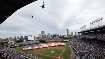 Jul 4, 2024; Chicago, Illinois, USA; US flag is seen during pre-game Fourth of July ceremonies prior to a baseball game between the Chicago Cubs and Philadelphia Phillies at Wrigley Field.  Kamil Krzaczynski-USA TODAY Sports