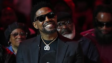 Jan 19, 2024; Miami, Florida, USA; Former Miami Heat player Udonis Haslem sits on the court for his jersey retirement ceremony during halftime of the game between the Miami Heat and the Atlanta Hawks Kaseya Center. Mandatory Credit: Jasen Vinlove-Imagn Images