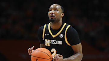 Feb 5, 2025; Knoxville, Tennessee, USA; Missouri Tigers guard Tamar Bates (2) gets ready to shoot a free throw against the Tennessee Volunteers during the second half at Thompson-Boling Arena at Food City Center. Mandatory Credit: Randy Sartin-Imagn Images
