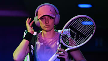 Iga Swiatek prefers listening to rock music before tennis matches.