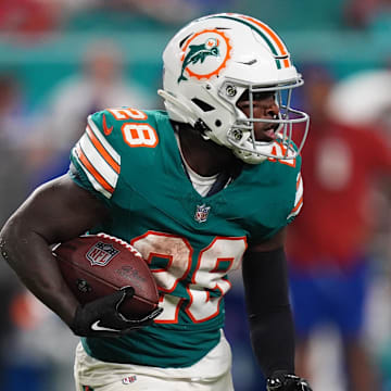 Sep 12, 2024; Miami Gardens, Florida, USA; Miami Dolphins running back De'Von Achane (28) rushes with the ball against the Buffalo Bills during the second half at Hard Rock Stadium. Mandatory Credit: Jasen Vinlove-Imagn Images