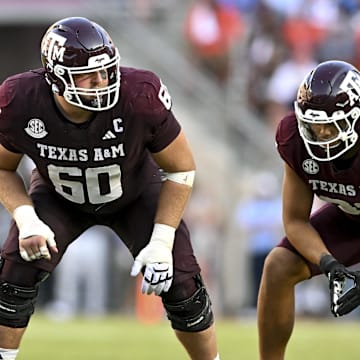 Sep 27, 2025; College Station, Texas, USA; Texas A&M Aggies offensive lineman Trey Zuhn III (60) lines up during the fourth quarter against the Auburn Tigers at Kyle Field. Mandatory Credit: Maria Lysaker-Imagn Images 