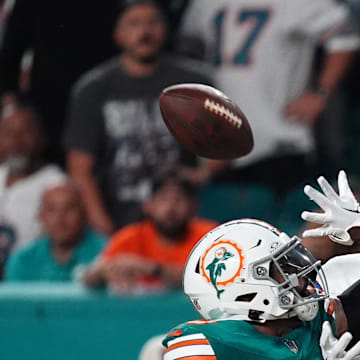 Miami Dolphins linebacker Jordyn Brooks (20) breaks up the pass to Buffalo Bills wide receiver Curtis Samuel (1) during the first half at Hard Rock Stadium in Week 2.