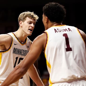 Nov 8, 2025; Minneapolis, Minnesota, USA; Minnesota Golden Gophers forward Cade Tyson (10) and guard Isaac Asuma (1) celebrate during the first half against the Alcorn State Braves at Williams Arena. Mandatory Credit: Matt Krohn-Imagn Images