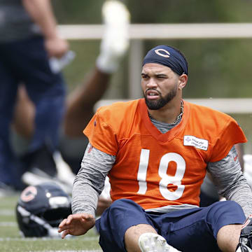 Jun 3, 2025; Lake Forest, IL, USA; Chicago Bears quarterback Caleb Williams (18) warms up during minicamp at Halas Hall. Mandatory Credit: Kamil Krzaczynski-Imagn Images