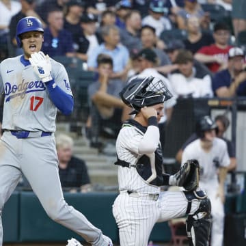 Los Angeles Dodgers designated hitter Shohei Ohtani (17) reacts after scoring against the Chicago White Sox during the third inning at Guaranteed Rate Field on June 25.