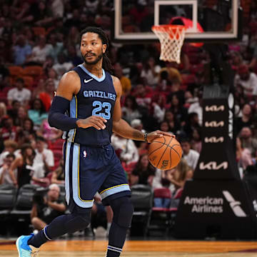 Oct 15, 2023; Miami, Florida, USA; Memphis Grizzlies guard Derrick Rose (23) dribbles the ball against the Miami Heat during the second half at Kaseya Center. Mandatory Credit: Jasen Vinlove-Imagn Images