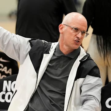 UCONN’s head men’s basketball coach Dan Hurley speaks with another coach during Nike EYBL at the Memphis Sports & Events Center on Saturday, May 17, 2025.