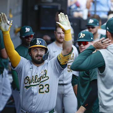 Oakland Athletics catcher Shea Langeliers (23) celebrates with teammates after hitting a solo home run against the Chicago White Sox during the ninth inning at Guaranteed Rate Field on Sept 15.