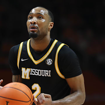 Feb 5, 2025; Knoxville, Tennessee, USA; Missouri Tigers guard Tamar Bates (2) gets ready to shoot a free throw against the Tennessee Volunteers during the second half at Thompson-Boling Arena at Food City Center. Mandatory Credit: Randy Sartin-Imagn Images