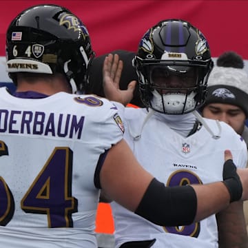 East Rutherford, NJ -- December 15, 2024 -- Tyler Linderbaum and Lamar Jackson of the Ravens during pre game warm ups as the Baltimore Ravens came to MetLife Stadium to play the New York Giants.