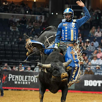 Rider Ezekiel Mitchell rides bull Misery Company during the PBR Pendleton Whisky Velocity Tour’s PBR Memphis event at FedExForum on Saturday, February 15, 2025.