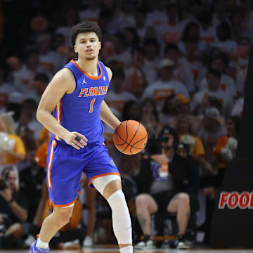 Feb 1, 2025; Knoxville, Tennessee, USA; Florida Gators guard Walter Clayton Jr. (1) brings the ball up court against the Tennessee Volunteers during the second half at Thompson-Boling Arena at Food City Center. Mandatory Credit: Randy Sartin-Imagn Images