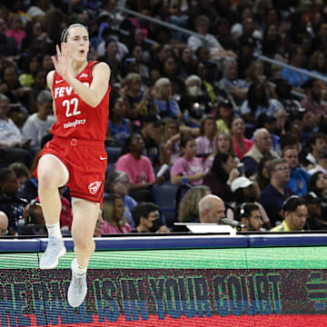 Aug 30, 2024; Chicago, Illinois, USA; Indiana Fever guard Caitlin Clark (22) celebrates after scoring against the Chicago Sky during the second half at Wintrust Arena. Mandatory Credit: Kamil Krzaczynski-USA TODAY Sports