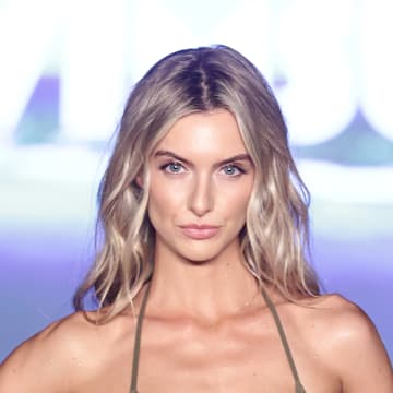 Ally Mason walks the runway for the Sports Illustrated Swimsuit Runway Show