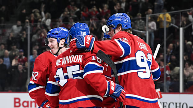 Laine celebrating a goal with his Canadiens teammate