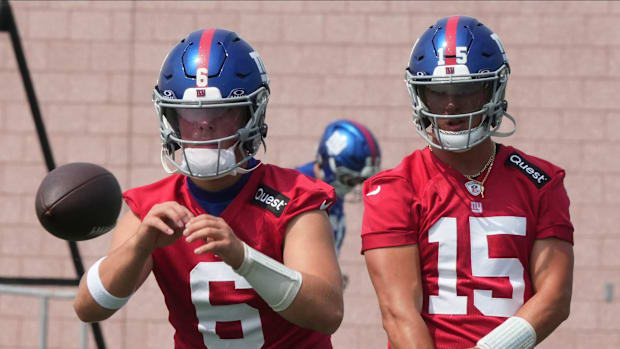 Quarterbacks Jaxson Dart and Tommy DeVito of the New York Giants  