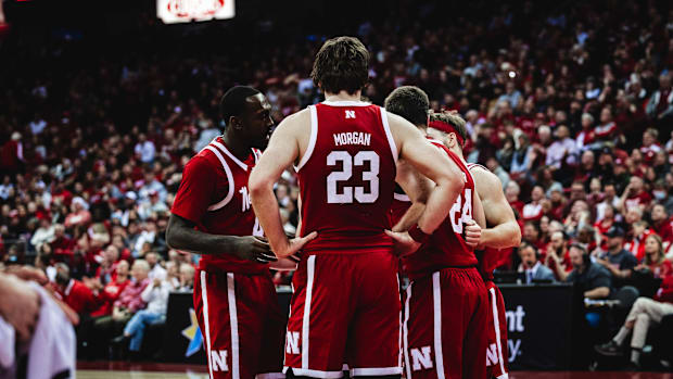 Nebraska basketball players huddle during a game at No. 18 Wisconsin on Jan. 26, 2025.