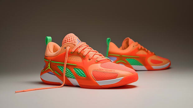 Orange and green basketball shoes top