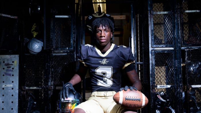 Radarious Jackson poses for a portrait in the football team's locker room at Sheffield High School