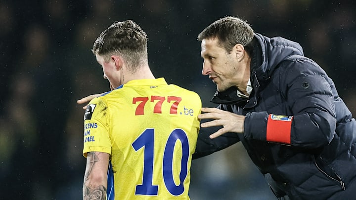 Alfie Devine taking advice on board during Westerlo's game at home to Gent 