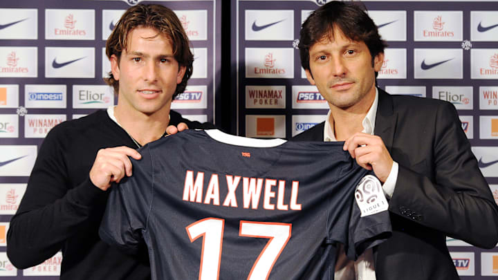 Maxwell on his presentation day with sporting director Leonardo in 2012