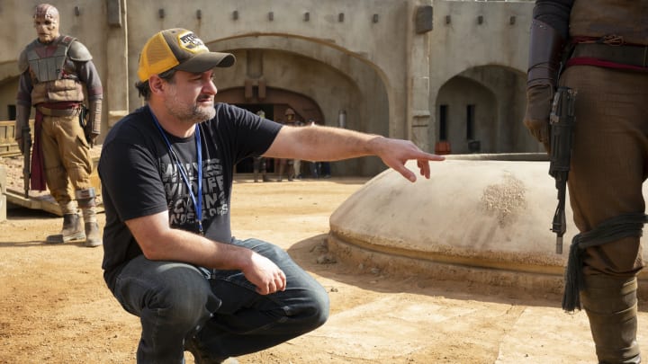 Disney Gallery: The Mandalorian Episode 1 "Directing" - Dave Filoni on the set of THE MANDALORIAN. Image Courtesy Disney+