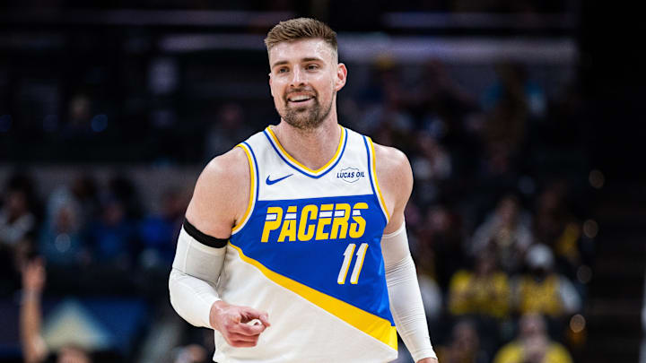 Mar 29, 2026; Indianapolis, Indiana, USA;  Indiana Pacers center Micah Potter (11) celebrates a made basket in the first half against the Miami Heat at Gainbridge Fieldhouse. Mandatory Credit: Trevor Ruszkowski-Imagn Images