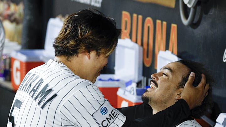 May 14, 2026; Chicago, Illinois, USA; Chicago White Sox first baseman Munetaka Murakami (5) jokes with third baseman Miguel Vargas (20) during the sixth inning at Rate Field. Mandatory Credit: Kamil Krzaczynski-Imagn Images