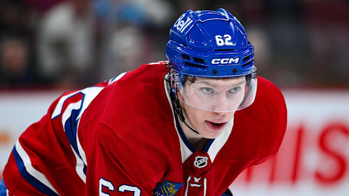 Feb 8, 2025; Montreal, Quebec, CAN; Montreal Canadiens center Owen Beck (62) waits for a face-off against the New Jersey Devils during the second period at Bell Centre. Mandatory Credit: David Kirouac-Imagn Images