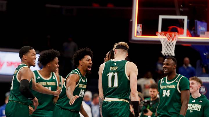 Jan 18, 2024; Memphis, Tennessee, USA; South Florida Bulls forward Sam Hines Jr. (20) slaps forward