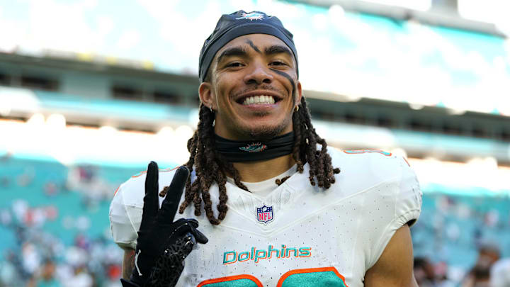Dec 17, 2023; Miami Gardens, Florida, USA; Miami Dolphins wide receiver Chase Claypool (83) celebrates after defeating the New York Jets at Hard Rock Stadium. Mandatory Credit: Jasen Vinlove-Imagn Images