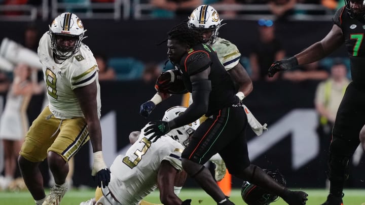 Oct 7, 2023; Miami Gardens, Florida, USA; Miami Hurricanes running back Donald Chaney Jr. (2) runs the ball against the Georgia Tech Yellow Jackets in the second half at Hard Rock Stadium. Mandatory Credit: Jasen Vinlove-USA TODAY Sports