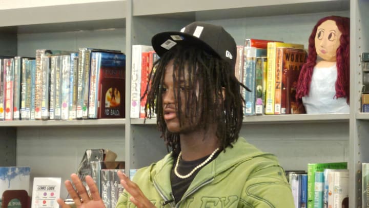 St. Augustine receiver Somourian Wingo makes the U symbol after committing to Miami football on July 17, 2025. [Clayton Freeman/Florida Times-Union]