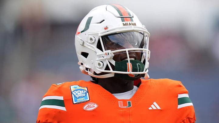 Dec 28, 2024; Orlando, FL, USA; Miami Hurricanes quarterback Cam Ward (1) warms up prior to the game against the Iowa State Cyclones at Camping World Stadium. Mandatory Credit: Jasen Vinlove-Imagn Images