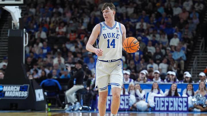 Mar 21, 2026; Greenville, SC, USA; Duke Blue Devils guard Nikolas Khamenia (14) brings the ball up court against the Texas Christian University Horned Frogs during a second round game of the men's 2026 NCAA Tournament at Bon Secours Wellness Arena. Mandatory Credit: Jim Dedmon-Imagn Images