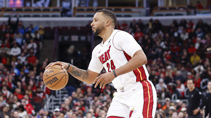 Jan 29, 2026; Chicago, Illinois, USA; Miami Heat guard Norman Powell (24) brings the ball up court against the Chicago Bulls during the second half at United Center. Mandatory Credit: Kamil Krzaczynski-Imagn Images