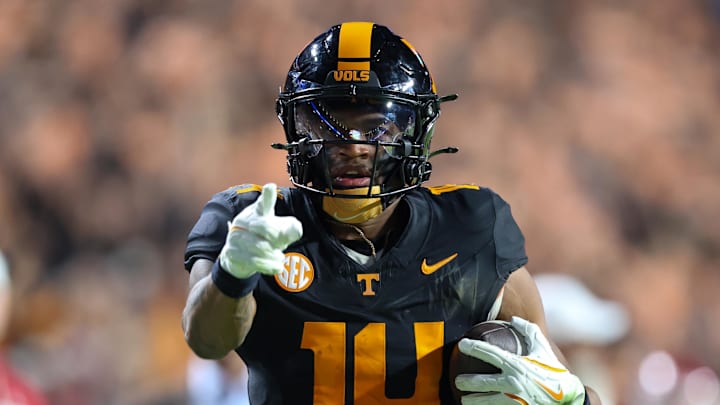 Nov 1, 2025; Knoxville, Tennessee, USA; Tennessee Volunteers wide receiver Braylon Staley (14) runs for a touchdown against the Oklahoma Sooners during the second half at Neyland Stadium. Mandatory Credit: Randy Sartin-Imagn Images