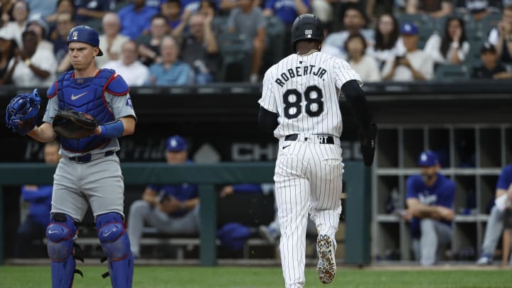 Jun 25, 2024; Chicago, Illinois, USA; Chicago White Sox outfielder Luis Robert Jr. (88) scores against the Los Angeles Dodgers during the first inning at Guaranteed Rate Field. Mandatory Credit: Kamil Krzaczynski-USA TODAY Sports
