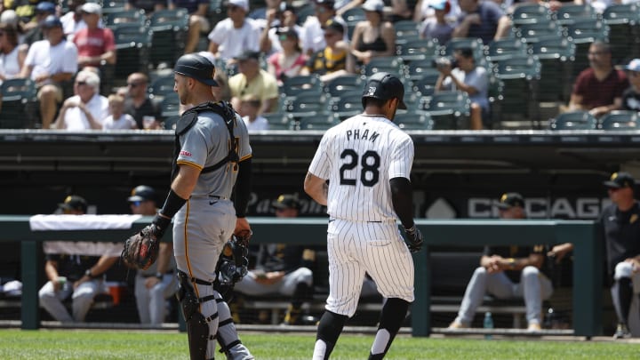 Jul 14, 2024; Chicago, Illinois, USA; Chicago White Sox outfielder Tommy Pham (28) scores against the Pittsburgh Pirates during the first inning at Guaranteed Rate Field. Mandatory Credit: Kamil Krzaczynski-USA TODAY Sports