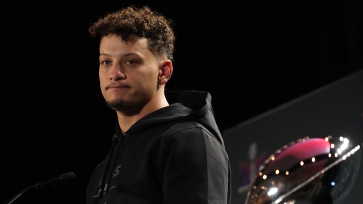 Feb 12, 2024; Las Vegas, NV, USA; Kansas City Chiefs quarterback Patrick Mahomes speaks at the Super Bowl LVIII Winning Head Coach and Most Valuable Player Press Conference flanked by the Vince Lombardi trophy at the Super Bowl 58 media center at the Mandalay Bay North Convention Center. Mandatory Credit: Kirby Lee-USA TODAY Sports