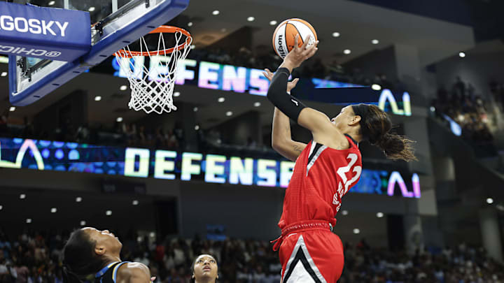 Aug 25, 2024; Chicago, Illinois, USA; Las Vegas Aces center A'ja Wilson (22) shoots and scores game winning basket against the Chicago Sky during the second half at Wintrust Arena. Mandatory Credit: Kamil Krzaczynski-USA TODAY Sports