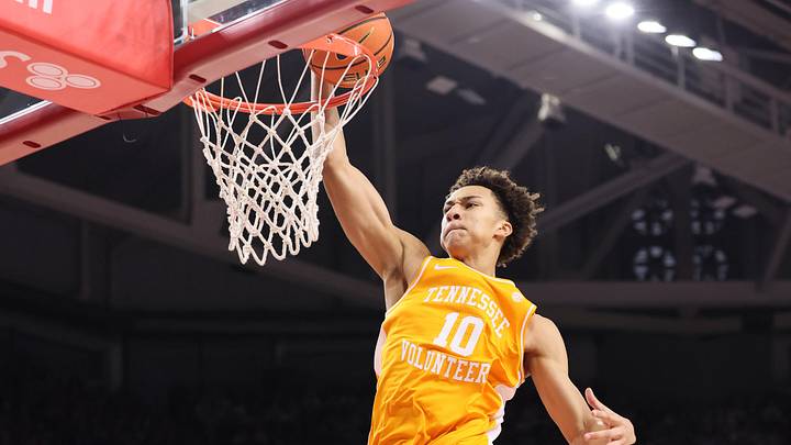 Jan 3, 2026; Fayetteville, Arkansas, USA; Tennessee Volunteers forward Nate Ament (10) dunks the ball in the first half against the Arkansas Razorbacks at Bud Walton Arena. Mandatory Credit: Nelson Chenault-Imagn Images