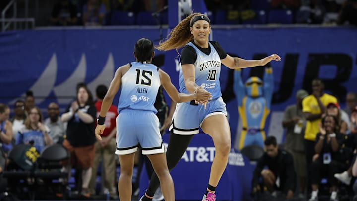 South Carolina basketball alum Kamilla Cardoso celebrating a made basket with Chicago Sky teammate Lindsay Allen.