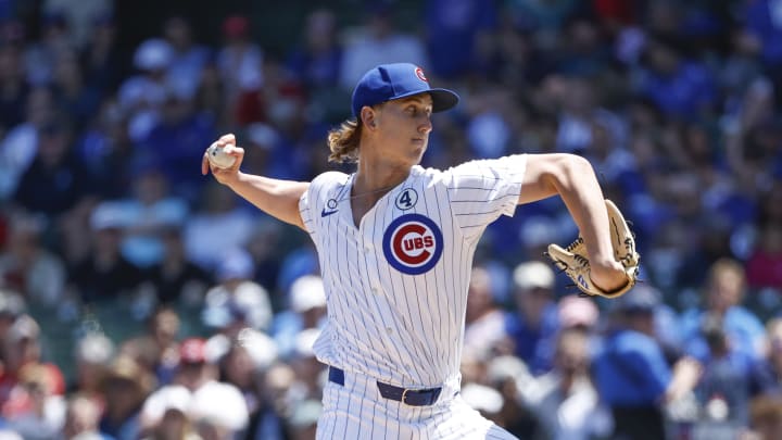 Jun 2, 2024; Chicago, Illinois, USA; Chicago Cubs starting pitcher Ben Brown (32) delivers a pitch against the Cincinnati Reds during the first inning at Wrigley Field. Mandatory Credit: Kamil Krzaczynski-USA TODAY Sports