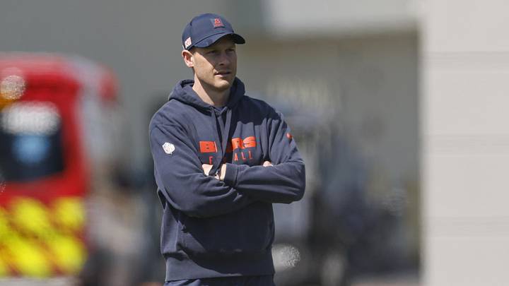 May 9, 2025; Lake Forest, IL, USA; Chicago Bears head coach Ben Johnson (R) looks on during the Rookie Minicamp at Halas Hall. Mandatory Credit: Kamil Krzaczynski-Imagn Images